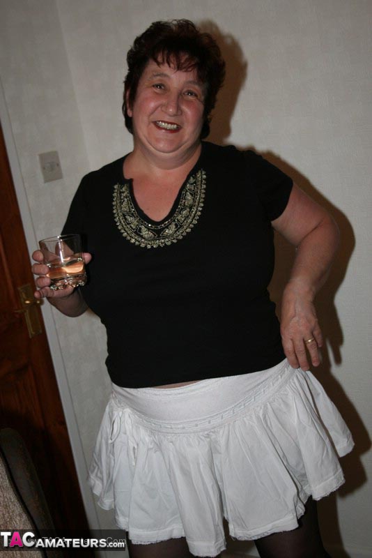 Bbw Granny Takes Off Her Black Shirt And White Bra And Lets ...